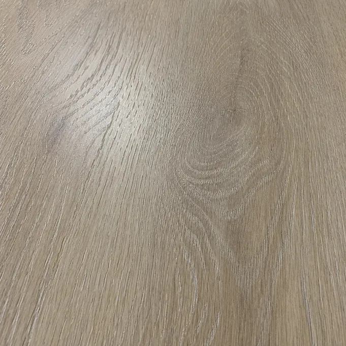 Close-up of a textured wood-look flooring surface